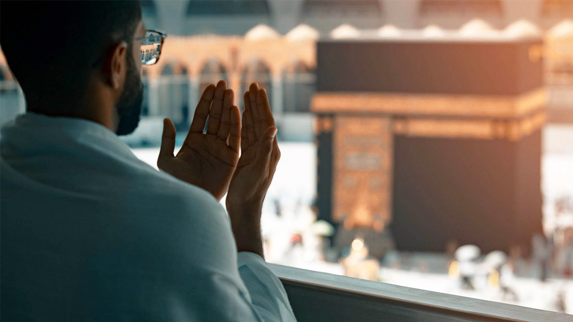 Muslim parent reading the Quran with child at home, reflecting Islamic values, family bonding, and spiritual education through Quranic teachings