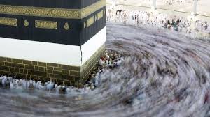 Male pilgrims performing Tawaf around the Kaaba in Masjid al-Haram, Makkah, showing the practice of Raml (brisk walking) during the first three circuits